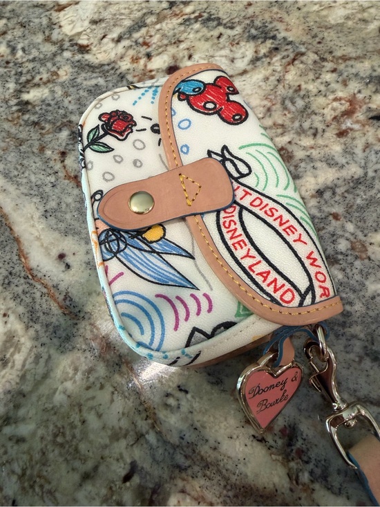 Dooney & Bourke Handbags - Dooney & Bourke White Disney Sketch Wristlet with Tan Trim
